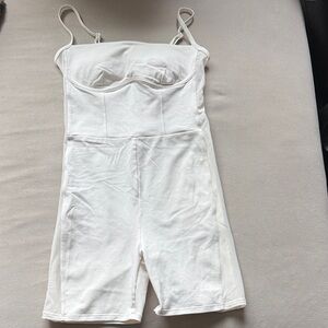 ALO Yoga Ivory romper with Sides mesh detail both sides have the mesh detail